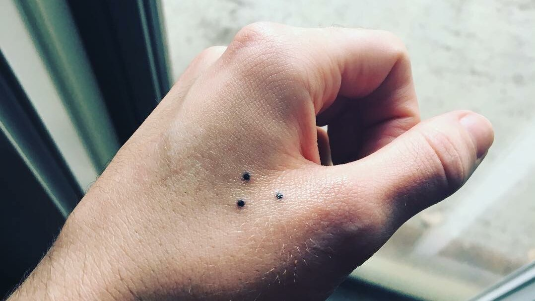 The ‘three-dot tattoo’ – potential meaning and significance